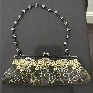 Elegant Black and Gold Beaded Clutch